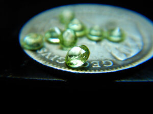 JGG facetted circle peridot .05