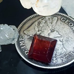 Facetted square Garnet roughly .9 ct