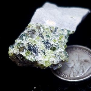Peridot cluster in host 10 gr