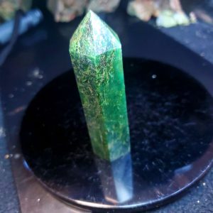 Green tower 3" tall with crack at base