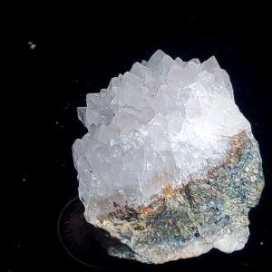 Quartz crystal plate E