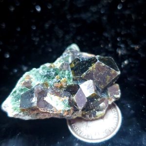 Green garnets on host 1.25" across
