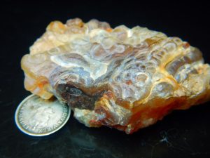 Agate from fire agate site 2" across